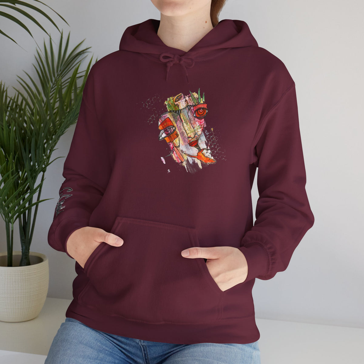 Angel artwork hoodie by C.Cambrea, folded product display