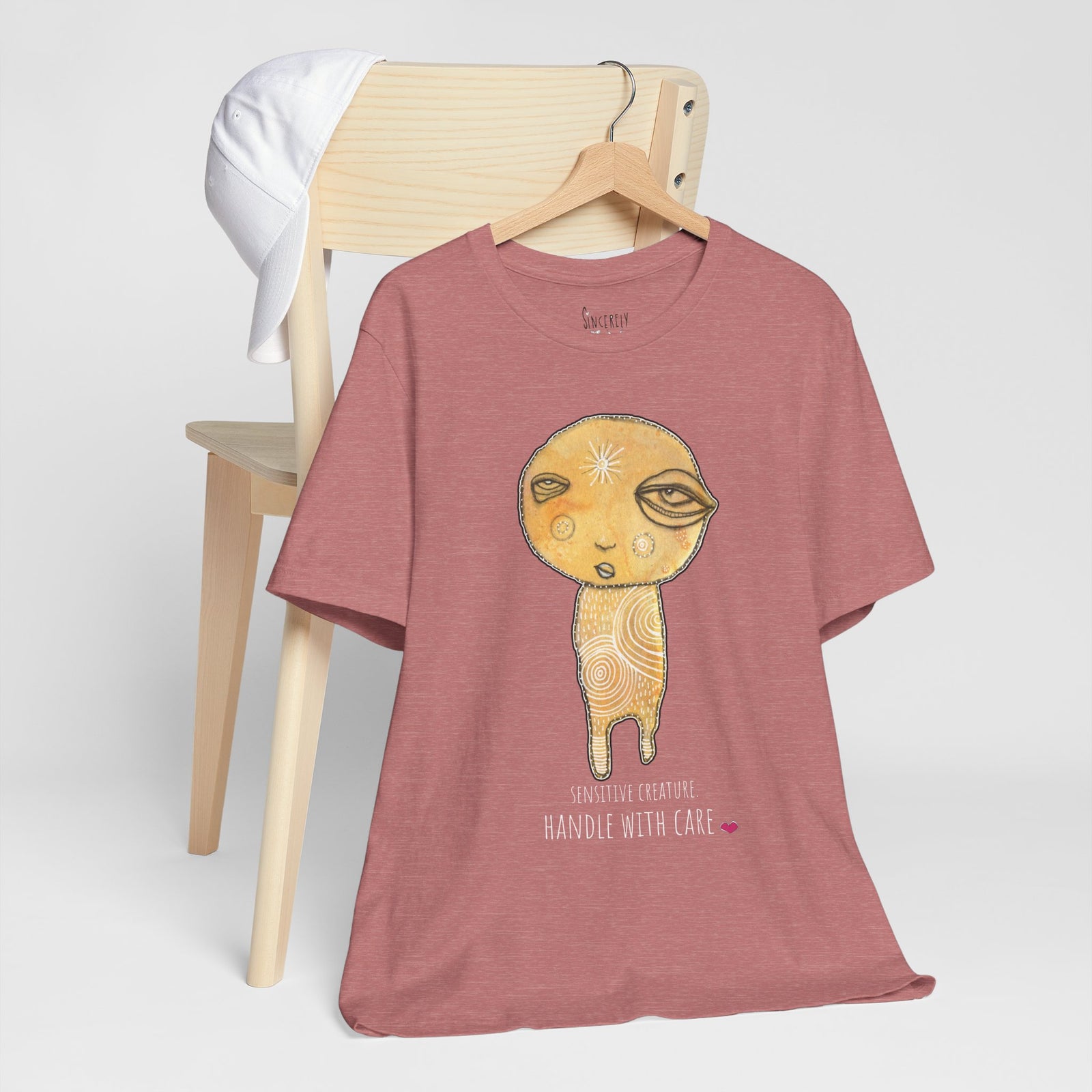 Sensitive Creature. Handle with Care t-shirt by C.Cambrea, front view on model