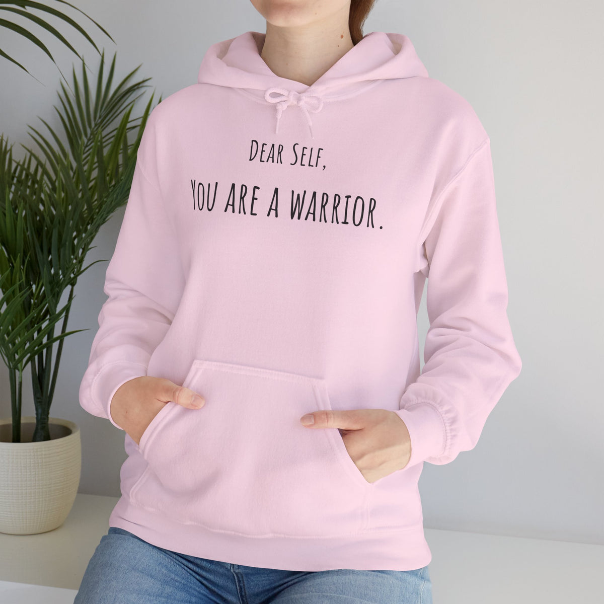 Dear Self, You Are a Warrior hoodie by C.Cambrea, front view on model