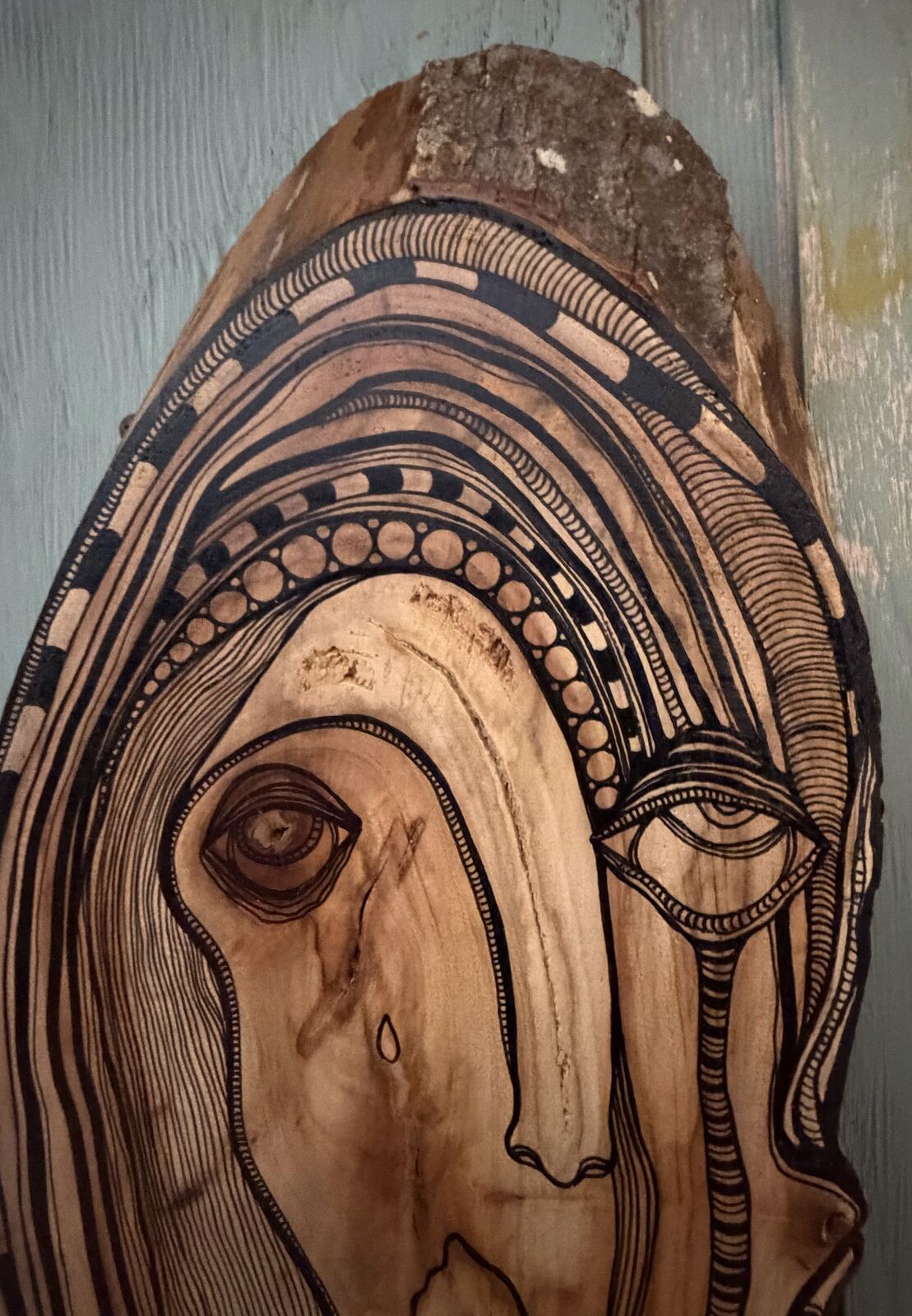 AHHH - detail view of top arches and main eye, wood burned pyrography art by C. Cambrea
