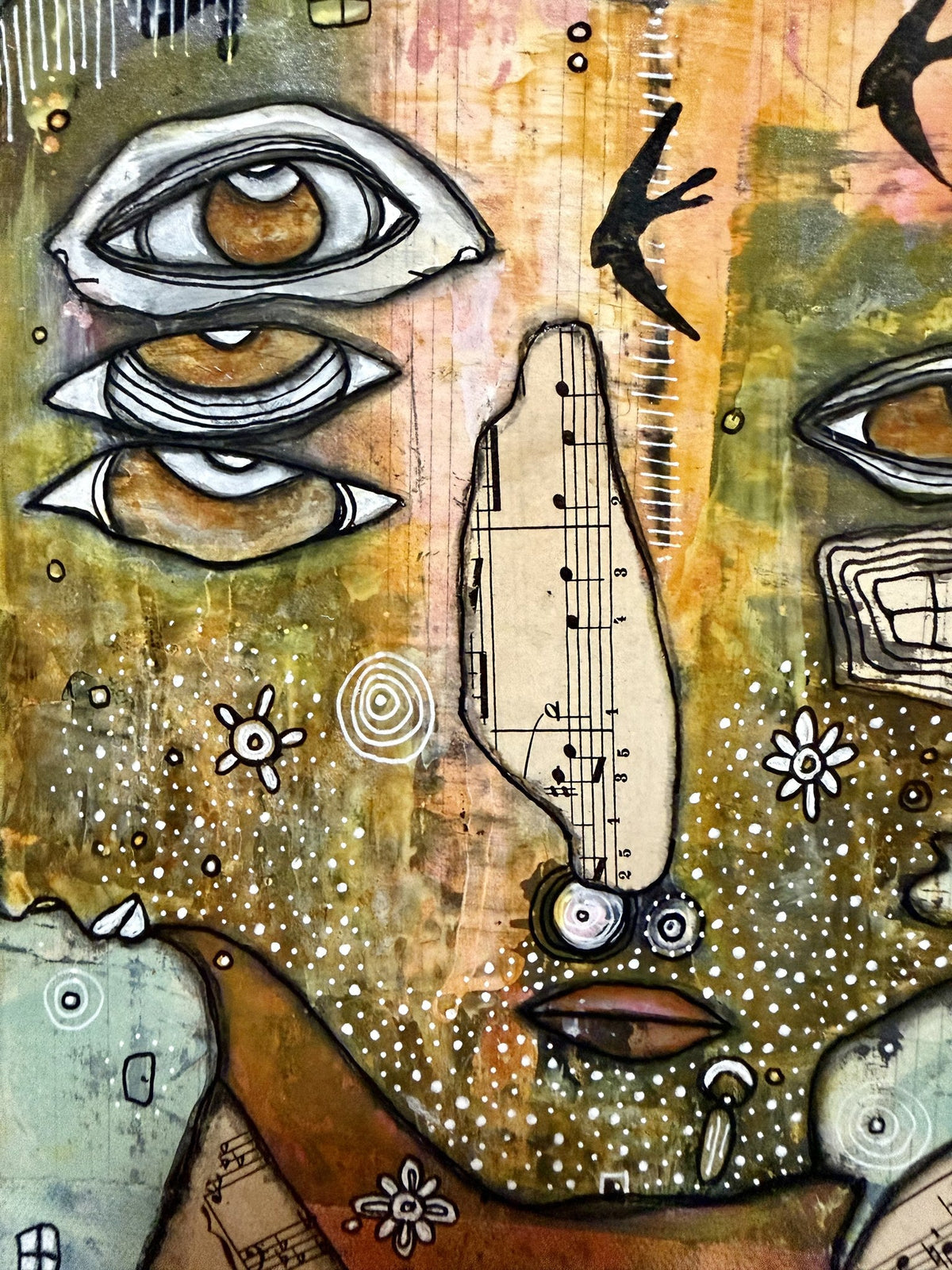Close-up of three stacked eyes, sheet-music nose shape, flying bird, and hand-drawn flowers