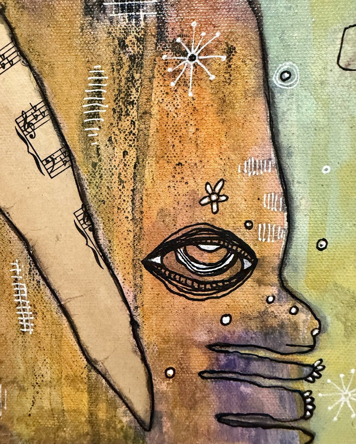 Macro detail of a painted eye with dotted texture, sheet-music edge, and star accents