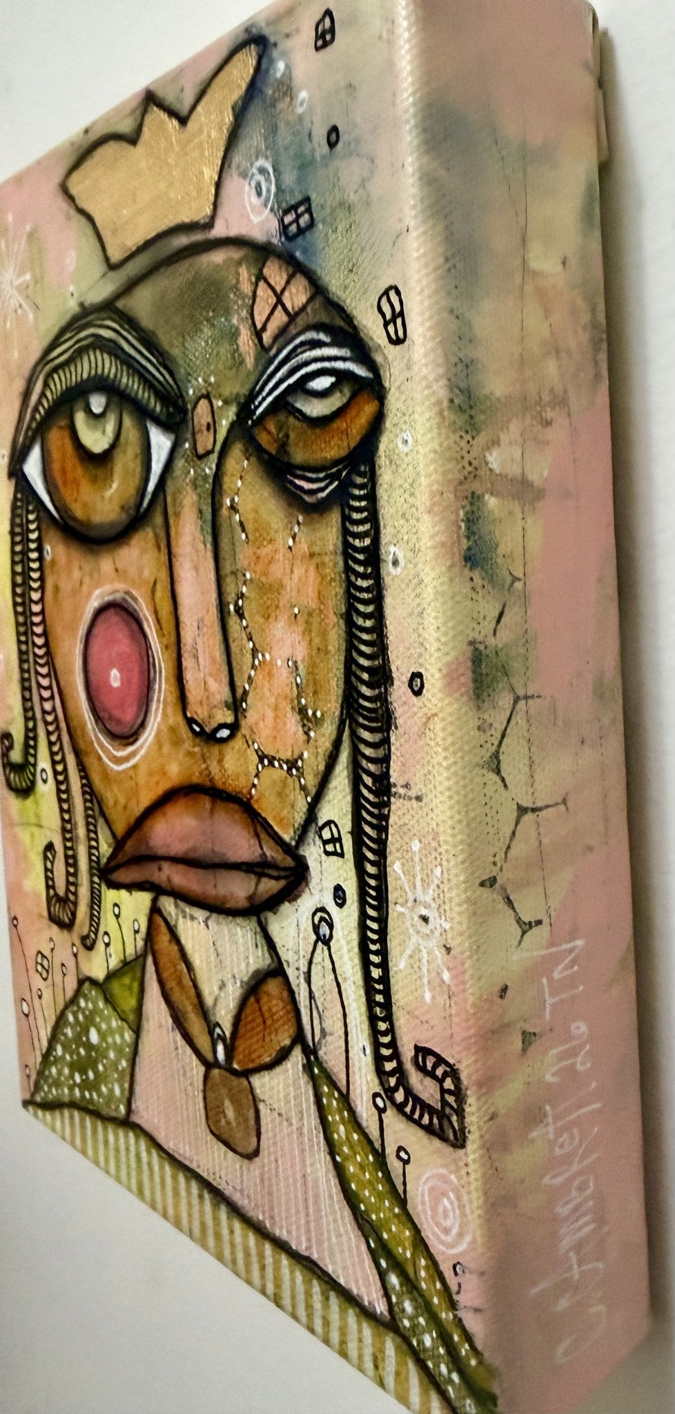 Side view of the canvas edge showing its 1.5 inch depth and the artist's signature.