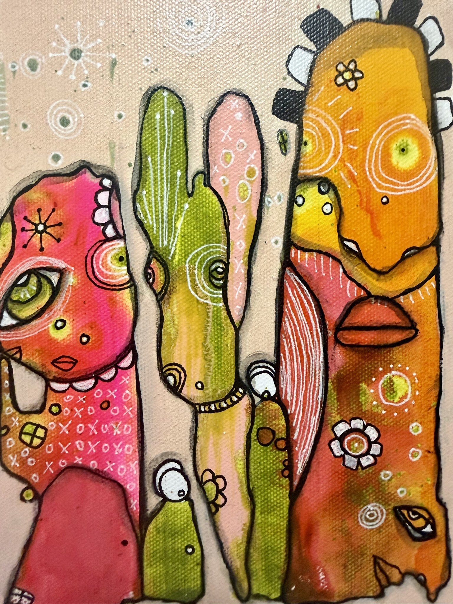 Detail view of the mixed media painting showing intricate hidden faces, spiral eyes, and floral patterns.