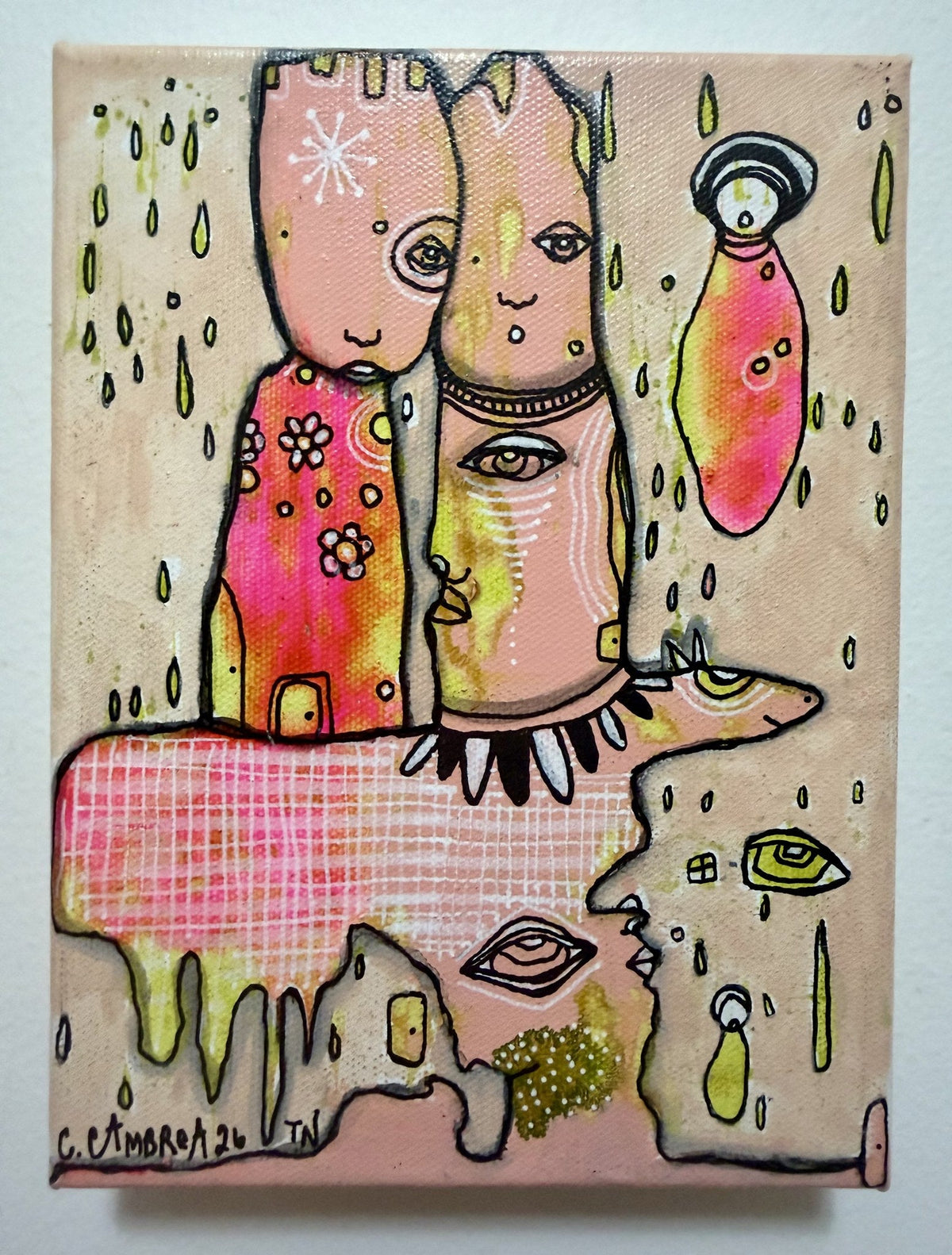 Front view of the mixed media painting showing layered faces, eyes, and dripping paint textures.
