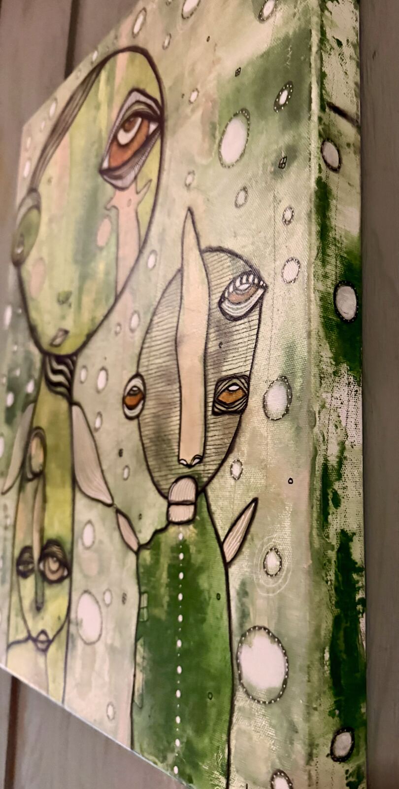 Angled corner view of "Connected" showing canvas depth and bubble details