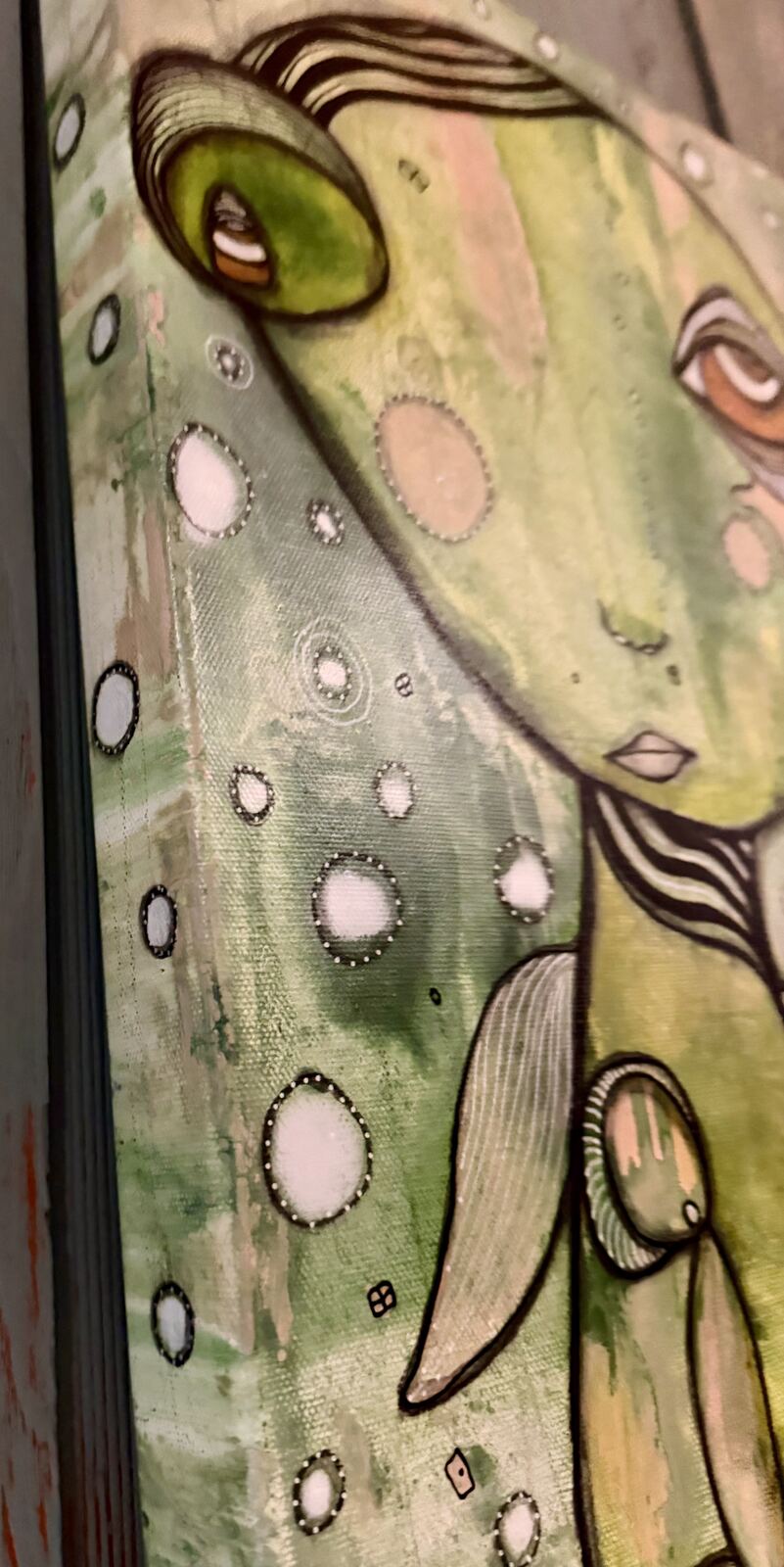 Angled close-up of the striped ear and hair detail in "Connected"