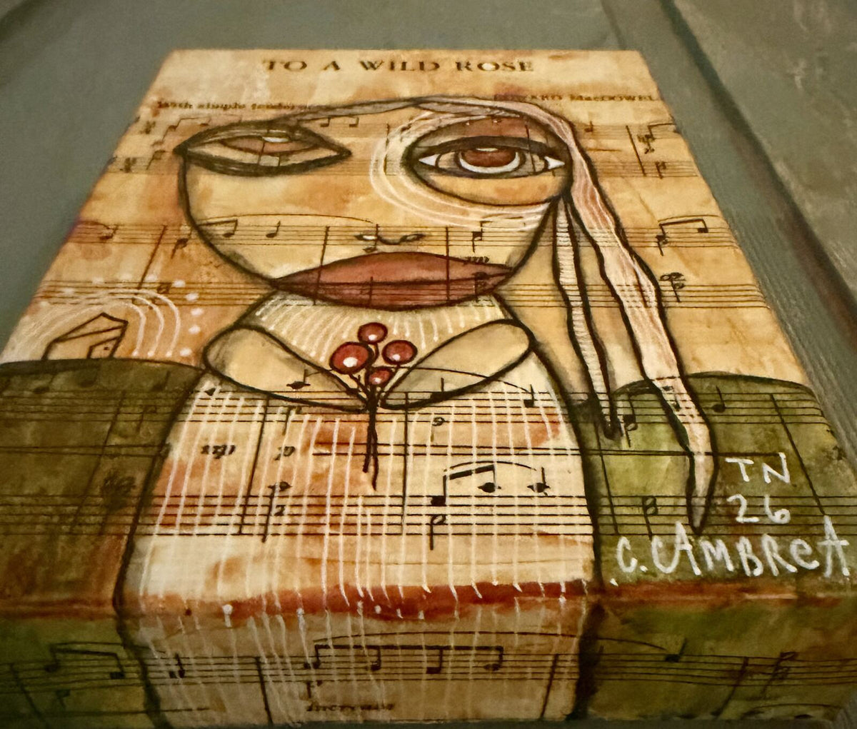 Angled view of "To A Wild Rose" showing the canvas edge and depth
