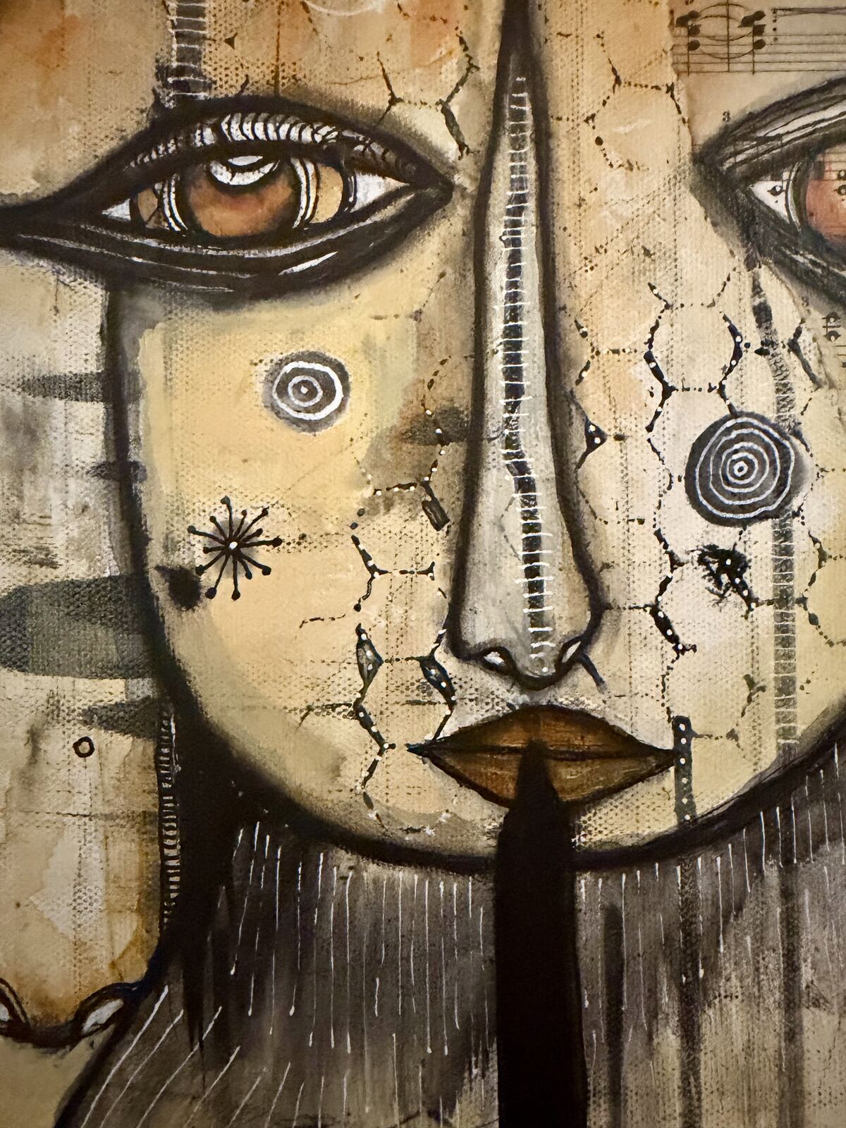 Close-up detail of the nose, lips, and honeycomb texture in "Welcome"