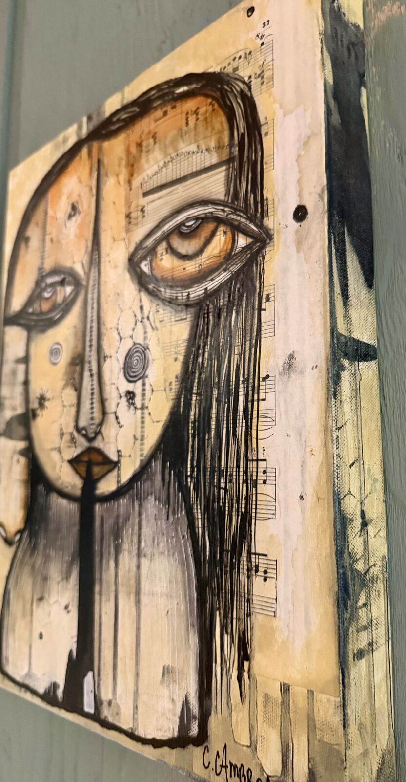 Angled view of "Welcome" showing the canvas edge and depth