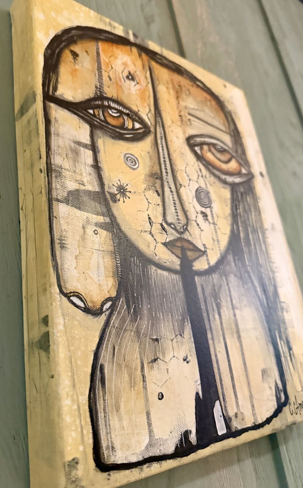 Angled side view of "Welcome" canvas showing painted edge, signed by C. Cambrea