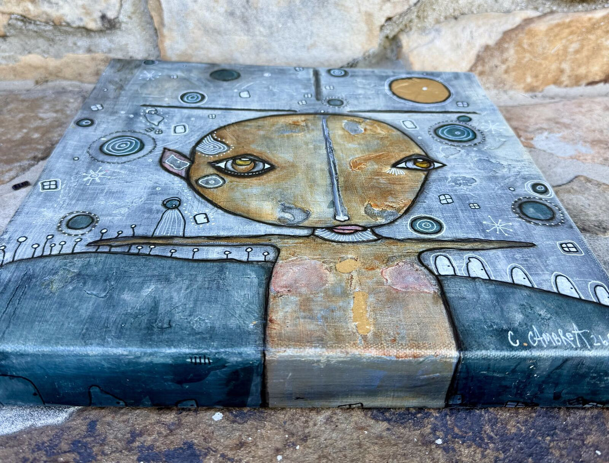 Angled view of "Under The Moon" showing the gold leaf moon and canvas depth, signed by C. Cambrea