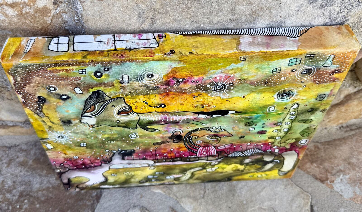 Angled side view of "The In Between" showing the scene and canvas edge