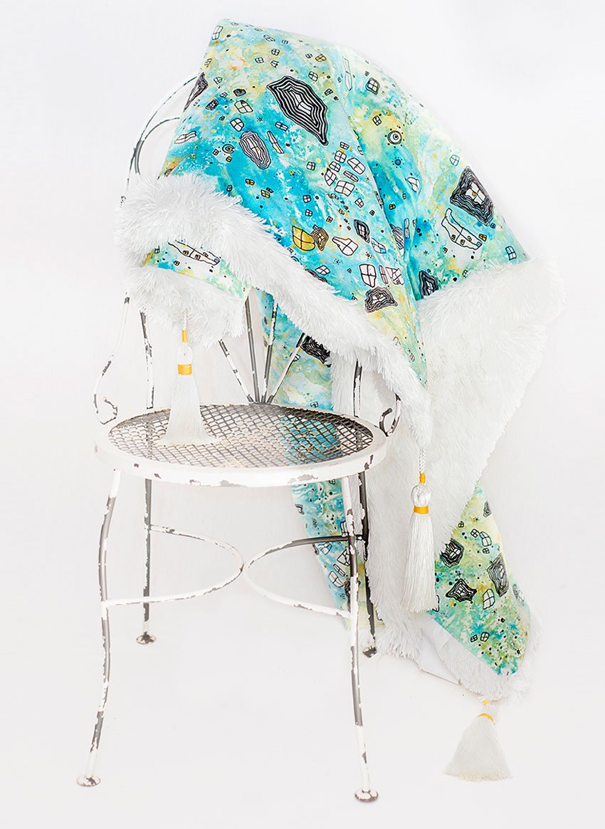 blanket-chair-surreal-sky